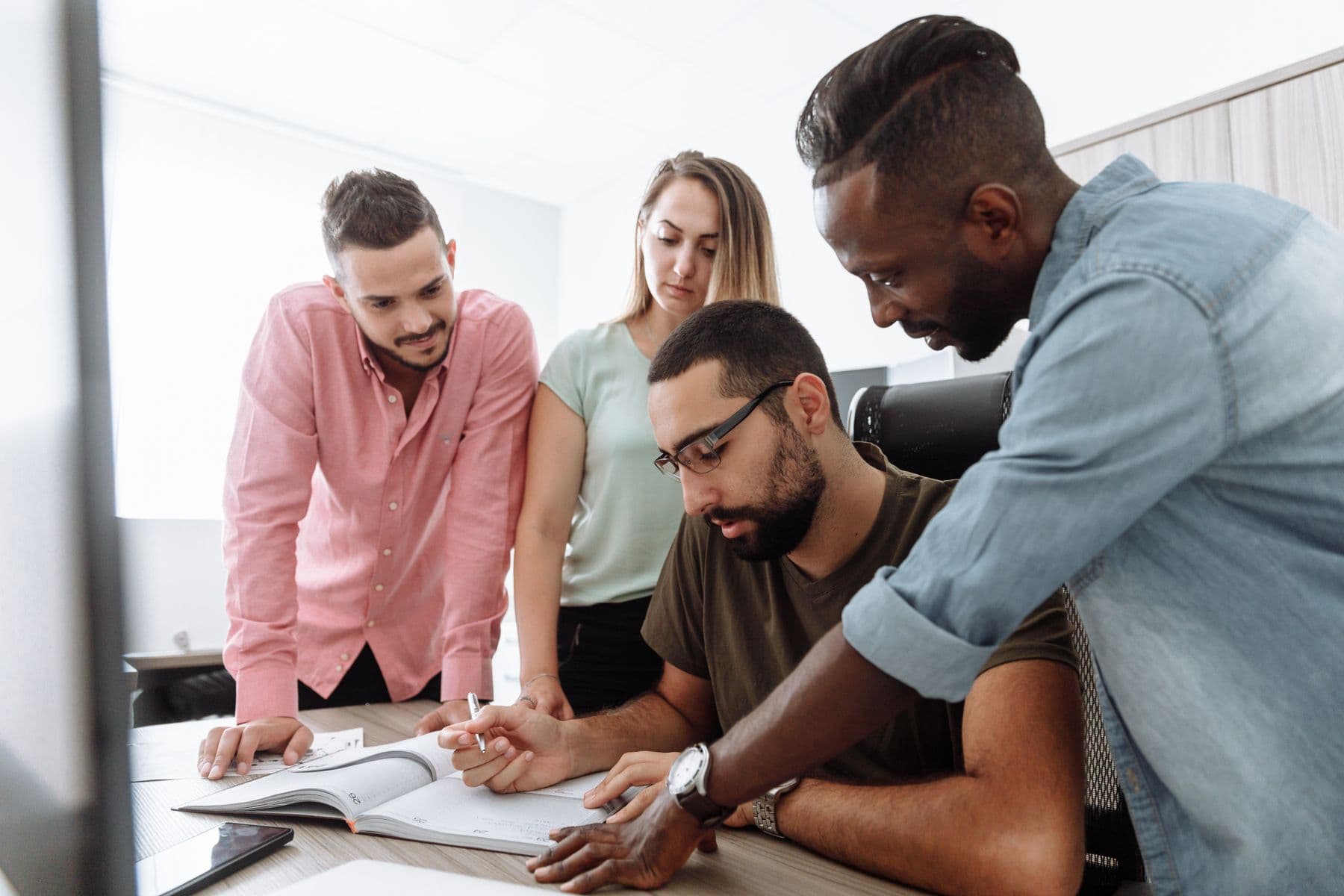 Professionals collaborating on a project